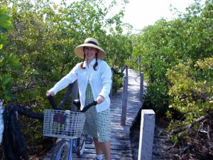 Lisa with bicycle and mangroves
